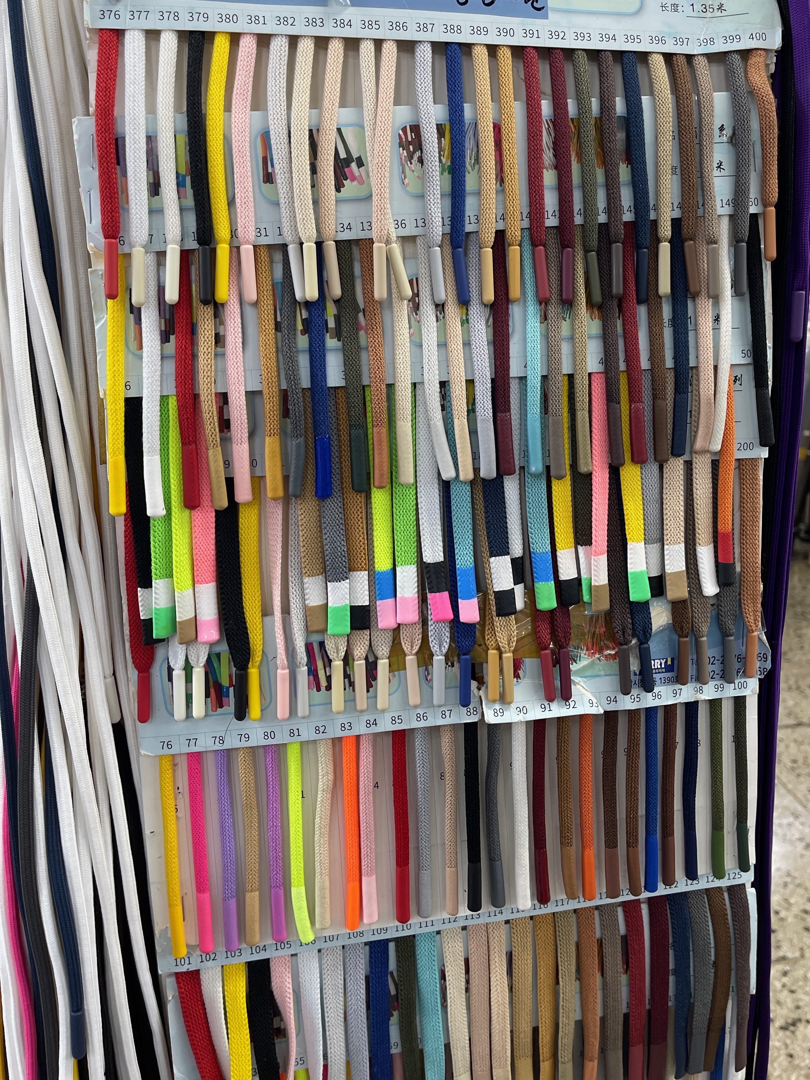 A display of colorful subsidary swatches in dongdaemun market.