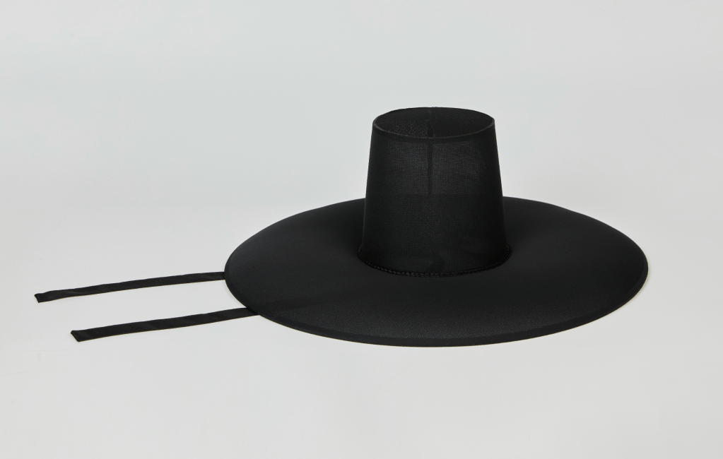 Korean traditional hat Gat, A black wide-brimmed hat with a tall, cylindrical crown and two long ties.