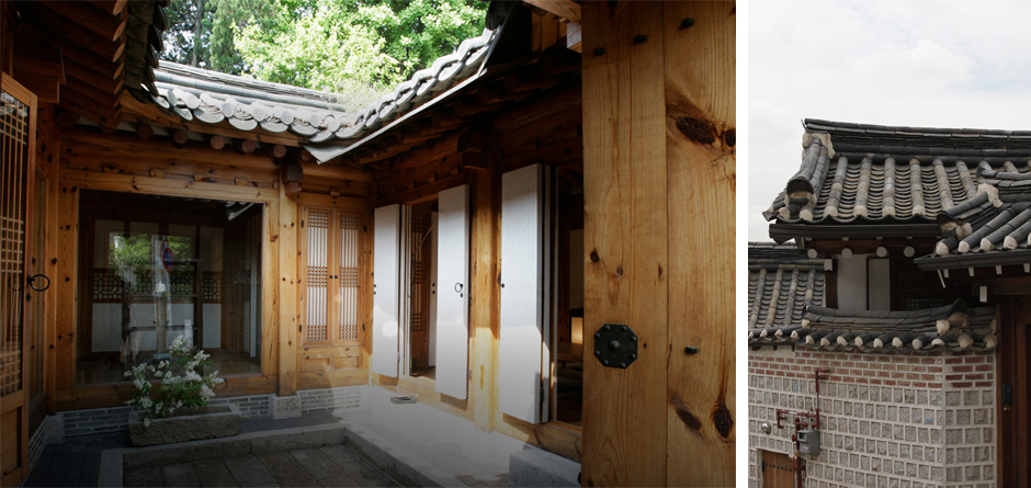 Interior view of a traditional Korean Hanok with wooden architecture and a small garden.